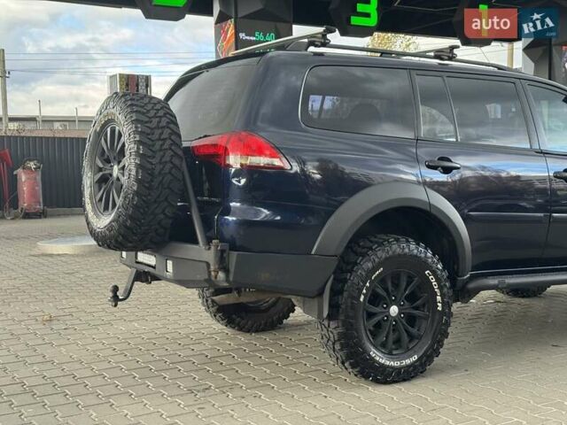 Синій Міцубісі Паджеро Спорт, об'ємом двигуна 2.48 л та пробігом 168 тис. км за 19999 $, фото 13 на Automoto.ua
