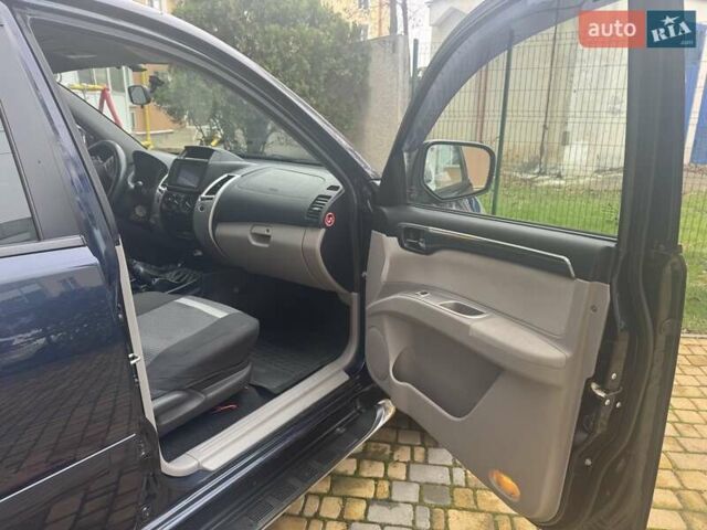 Синій Міцубісі Паджеро Спорт, об'ємом двигуна 2.5 л та пробігом 160 тис. км за 13900 $, фото 11 на Automoto.ua