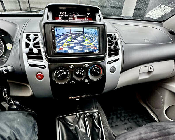 Синий Мицубиси Паджеро Спорт, объемом двигателя 2.48 л и пробегом 160 тыс. км за 14800 $, фото 5 на Automoto.ua