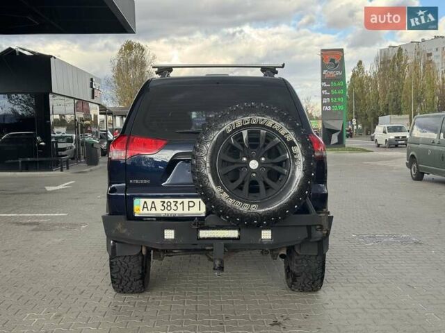 Синій Міцубісі Паджеро Спорт, об'ємом двигуна 2.48 л та пробігом 168 тис. км за 19999 $, фото 12 на Automoto.ua