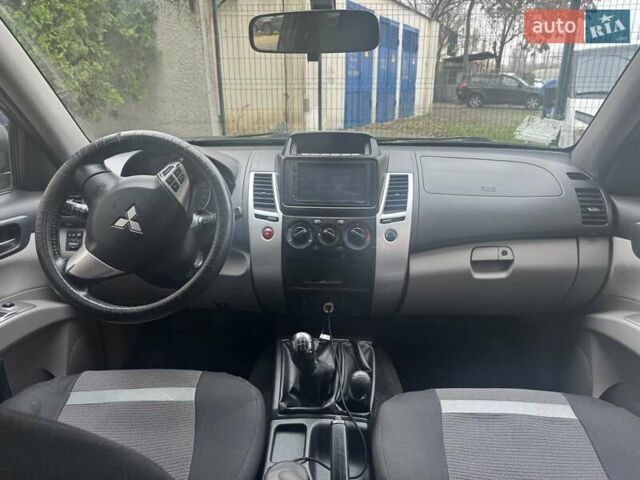 Синій Міцубісі Паджеро Спорт, об'ємом двигуна 2.5 л та пробігом 160 тис. км за 13900 $, фото 15 на Automoto.ua