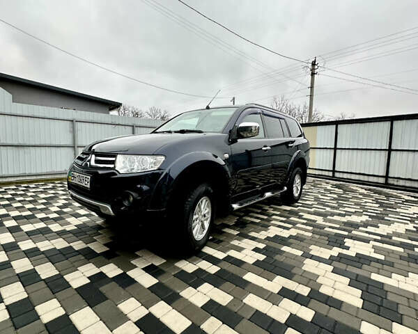 Синий Мицубиси Паджеро Спорт, объемом двигателя 2.48 л и пробегом 160 тыс. км за 14800 $, фото 1 на Automoto.ua
