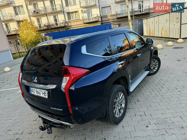 Синій Міцубісі Паджеро Спорт, об'ємом двигуна 2.44 л та пробігом 95 тис. км за 28300 $, фото 27 на Automoto.ua