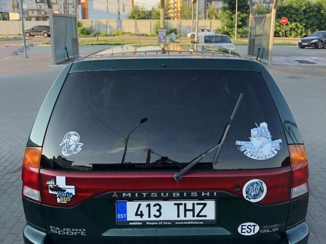 Зелений Міцубісі Паджеро Спорт, об'ємом двигуна 2.5 л та пробігом 338 тис. км за 2600 $, фото 5 на Automoto.ua