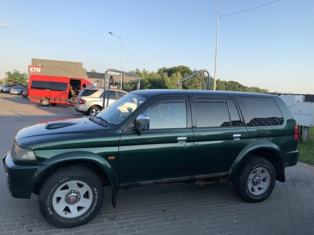 Зелений Міцубісі Паджеро Спорт, об'ємом двигуна 2.5 л та пробігом 338 тис. км за 2600 $, фото 3 на Automoto.ua