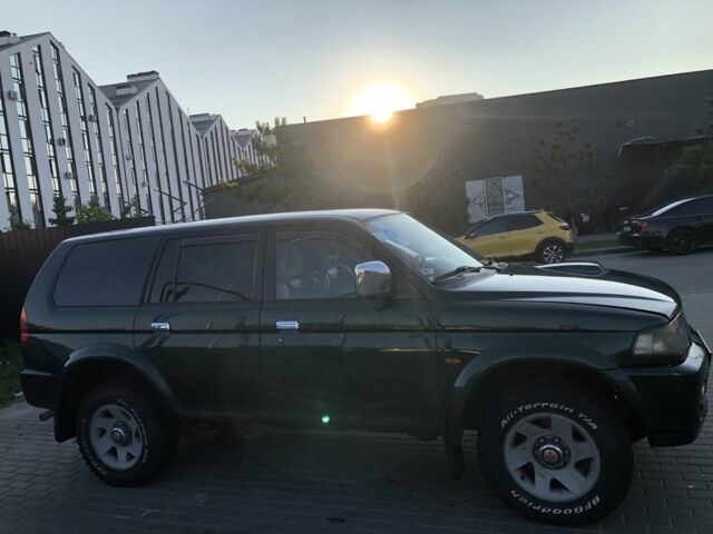 Зелений Міцубісі Паджеро Спорт, об'ємом двигуна 2.5 л та пробігом 338 тис. км за 2600 $, фото 4 на Automoto.ua