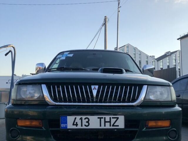 Зелений Міцубісі Паджеро Спорт, об'ємом двигуна 2.5 л та пробігом 338 тис. км за 2600 $, фото 1 на Automoto.ua