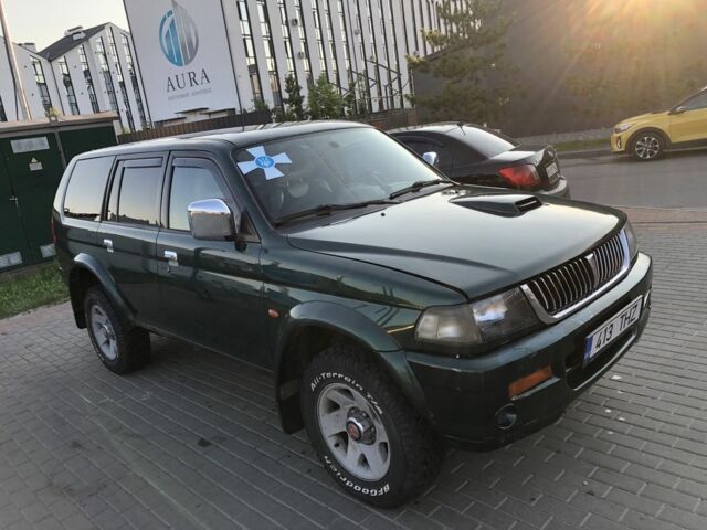 Зелений Міцубісі Паджеро Спорт, об'ємом двигуна 2.5 л та пробігом 338 тис. км за 2600 $, фото 2 на Automoto.ua