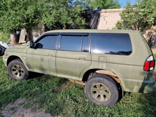 Мицубиси Паджеро Спорт 2003 в Петропавловке на Automoto.ua Зеленый Мицубиси Паджеро Спорт, объемом двигателя 2.5 л и пробегом 306 тыс. км за 4500 $, фото 1 на Automoto.ua