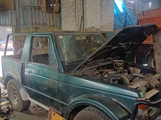 Зелений Міцубісі Паджеро Спорт, об'ємом двигуна 2.45 л та пробігом 120 тис. км за 3000 $, фото 3 на Automoto.ua