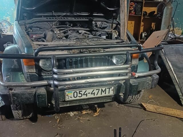 Зелений Міцубісі Паджеро Спорт, об'ємом двигуна 2.45 л та пробігом 120 тис. км за 3000 $, фото 2 на Automoto.ua