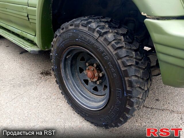 Зеленый Мицубиси Паджеро Спорт, объемом двигателя 2.9 л и пробегом 300 тыс. км за 2399 $, фото 6 на Automoto.ua