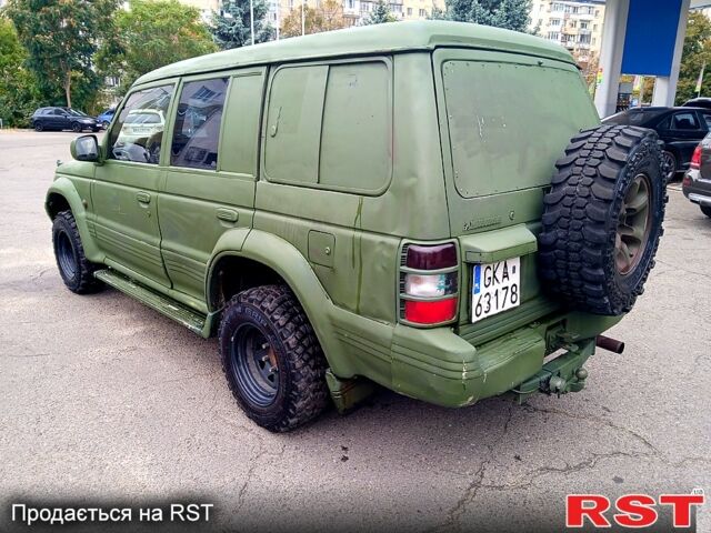 Зеленый Мицубиси Паджеро Спорт, объемом двигателя 2.9 л и пробегом 300 тыс. км за 2399 $, фото 3 на Automoto.ua