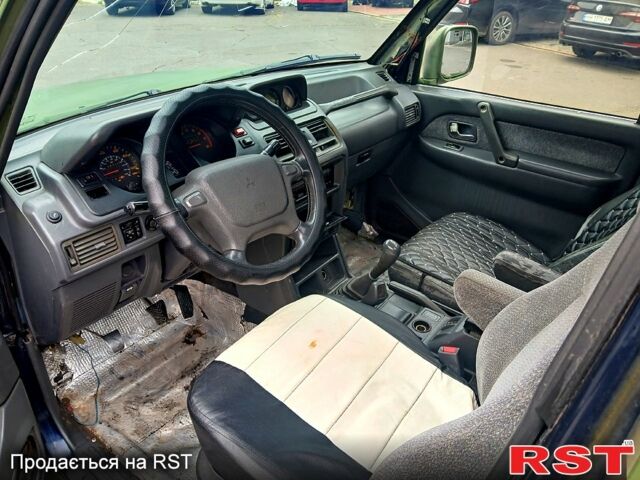 Зеленый Мицубиси Паджеро Спорт, объемом двигателя 2.9 л и пробегом 300 тыс. км за 2399 $, фото 7 на Automoto.ua