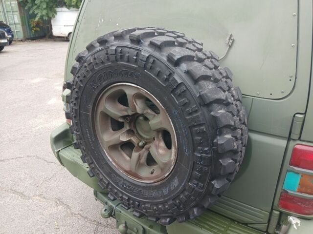 Зелений Міцубісі Паджеро Спорт, об'ємом двигуна 3 л та пробігом 300 тис. км за 2899 $, фото 9 на Automoto.ua