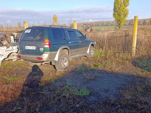 Зеленый Мицубиси Паджеро Спорт, объемом двигателя 3 л и пробегом 300 тыс. км за 5900 $, фото 1 на Automoto.ua