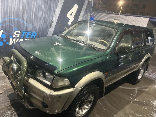 Зеленый Мицубиси Паджеро Спорт, объемом двигателя 3 л и пробегом 100 тыс. км за 4999 $, фото 1 на Automoto.ua