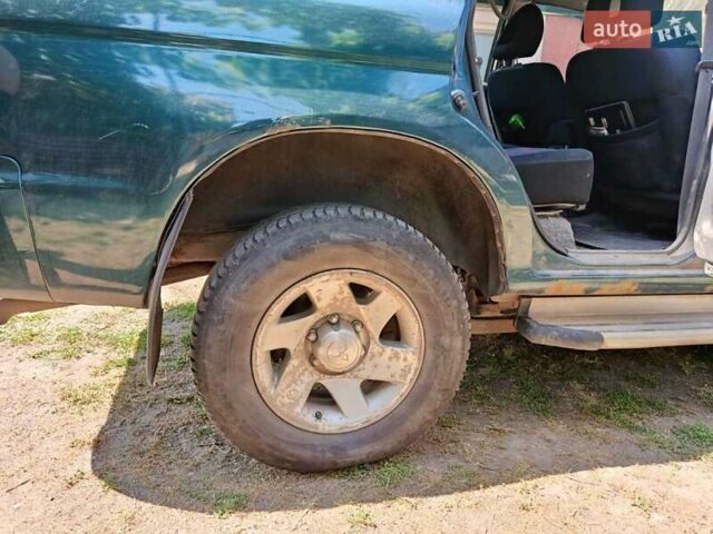 Зелений Міцубісі Паджеро Спорт, об'ємом двигуна 2.48 л та пробігом 320 тис. км за 5500 $, фото 3 на Automoto.ua