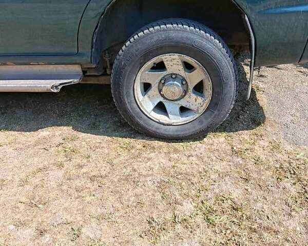 Зелений Міцубісі Паджеро Спорт, об'ємом двигуна 2.48 л та пробігом 320 тис. км за 5500 $, фото 4 на Automoto.ua