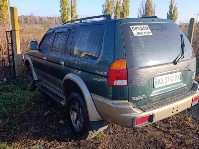 Зеленый Мицубиси Паджеро Спорт, объемом двигателя 3 л и пробегом 300 тыс. км за 5900 $, фото 2 на Automoto.ua