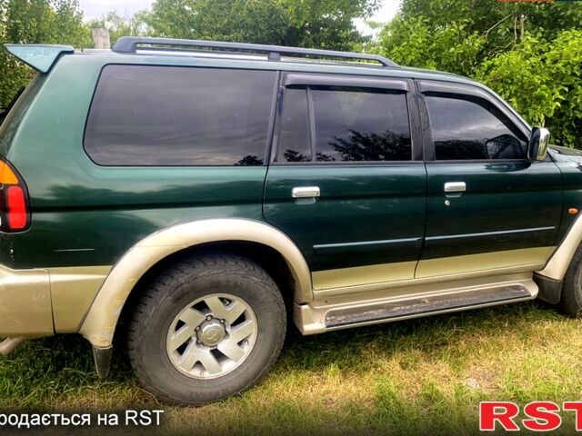 Зеленый Мицубиси Паджеро Спорт, объемом двигателя 3 л и пробегом 315 тыс. км за 4800 $, фото 3 на Automoto.ua