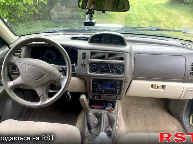 Зеленый Мицубиси Паджеро Спорт, объемом двигателя 3 л и пробегом 315 тыс. км за 4800 $, фото 4 на Automoto.ua