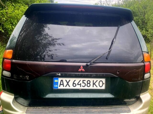 Зеленый Мицубиси Паджеро Спорт, объемом двигателя 3 л и пробегом 315 тыс. км за 4800 $, фото 2 на Automoto.ua