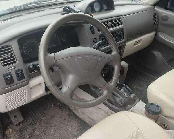 Зеленый Мицубиси Паджеро Спорт, объемом двигателя 2.97 л и пробегом 250 тыс. км за 4500 $, фото 2 на Automoto.ua