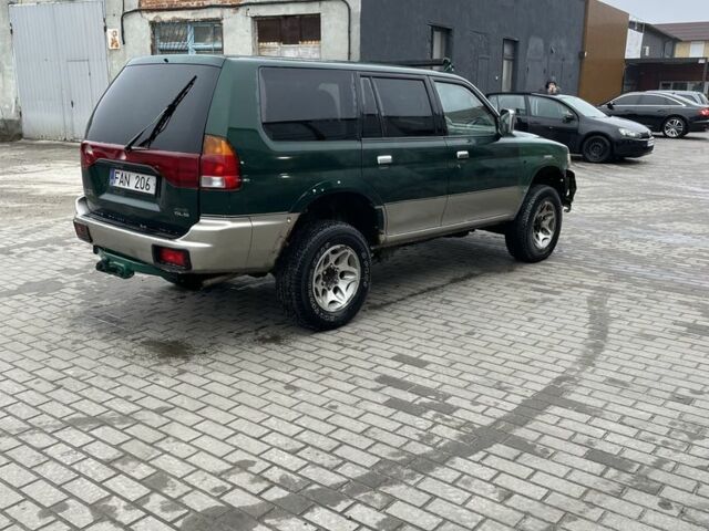 Зеленый Мицубиси Паджеро Спорт, объемом двигателя 2.5 л и пробегом 111 тыс. км за 3000 $, фото 2 на Automoto.ua