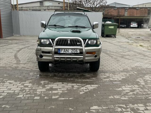 Зеленый Мицубиси Паджеро Спорт, объемом двигателя 2.5 л и пробегом 111 тыс. км за 3000 $, фото 4 на Automoto.ua