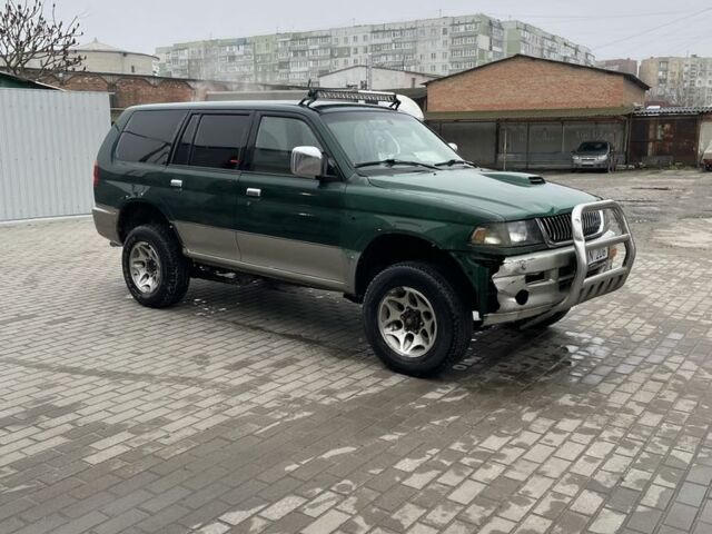 Зеленый Мицубиси Паджеро Спорт, объемом двигателя 2.5 л и пробегом 111 тыс. км за 3000 $, фото 3 на Automoto.ua