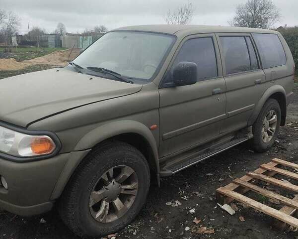 Зеленый Мицубиси Паджеро Спорт, объемом двигателя 2.97 л и пробегом 250 тыс. км за 4500 $, фото 1 на Automoto.ua