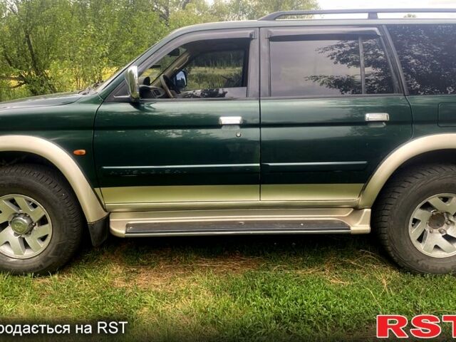 Зеленый Мицубиси Паджеро Спорт, объемом двигателя 3 л и пробегом 315 тыс. км за 4800 $, фото 1 на Automoto.ua