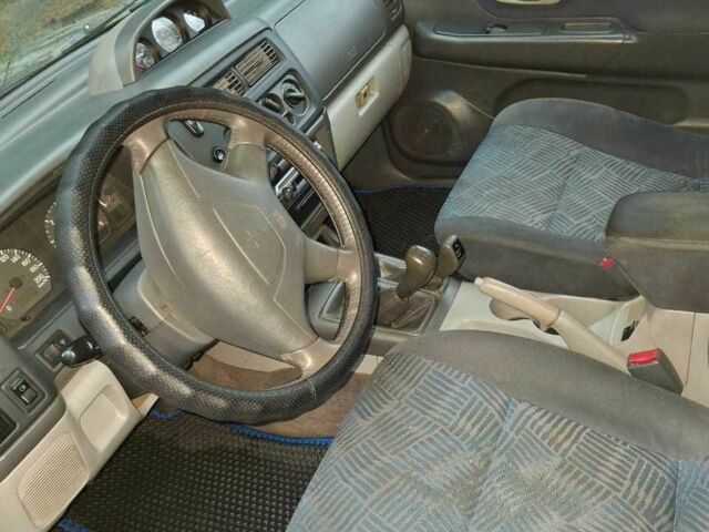 Зелений Міцубісі Паджеро Спорт, об'ємом двигуна 2.5 л та пробігом 250 тис. км за 5003 $, фото 3 на Automoto.ua