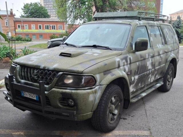 Зелений Міцубісі Паджеро Спорт, об'ємом двигуна 2.5 л та пробігом 250 тис. км за 5003 $, фото 11 на Automoto.ua