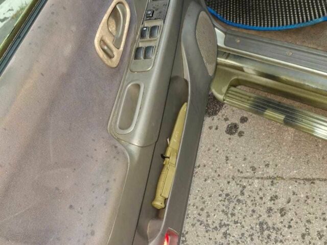 Зелений Міцубісі Паджеро Спорт, об'ємом двигуна 2.5 л та пробігом 250 тис. км за 5003 $, фото 6 на Automoto.ua