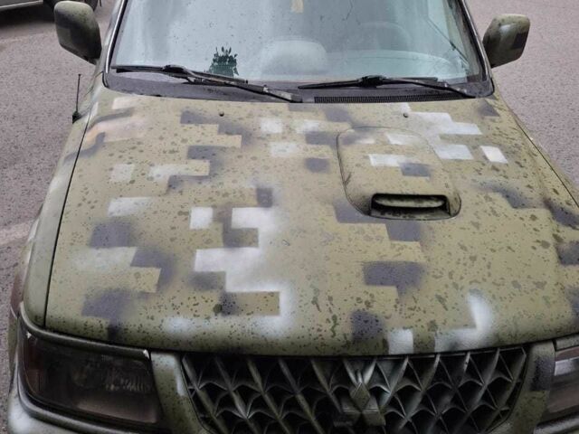 Зелений Міцубісі Паджеро Спорт, об'ємом двигуна 2.5 л та пробігом 250 тис. км за 5003 $, фото 5 на Automoto.ua