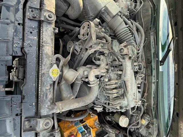 Зелений Міцубісі Паджеро Спорт, об'ємом двигуна 3 л та пробігом 289 тис. км за 2800 $, фото 8 на Automoto.ua