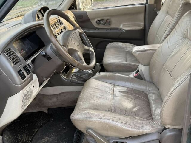 Зелений Міцубісі Паджеро Спорт, об'ємом двигуна 3 л та пробігом 289 тис. км за 2800 $, фото 6 на Automoto.ua