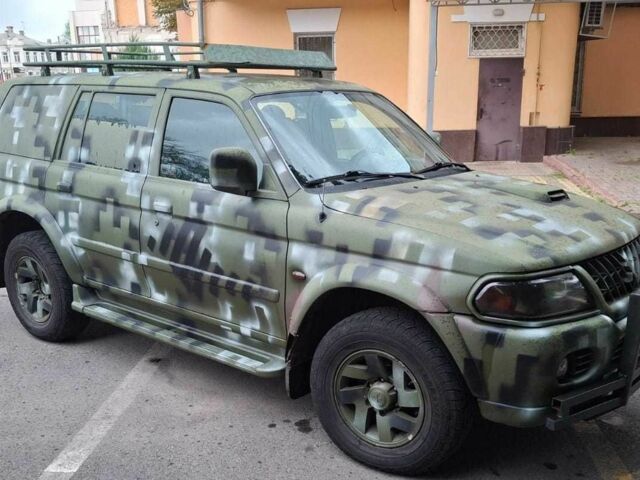 Зелений Міцубісі Паджеро Спорт, об'ємом двигуна 2.5 л та пробігом 250 тис. км за 5003 $, фото 12 на Automoto.ua