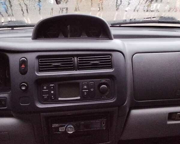 Зеленый Мицубиси Паджеро Спорт, объемом двигателя 3 л и пробегом 250 тыс. км за 6000 $, фото 3 на Automoto.ua