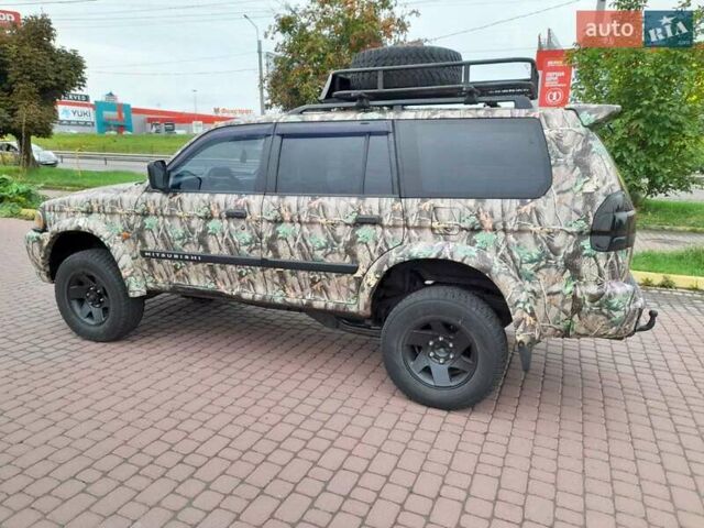 Зеленый Мицубиси Паджеро Спорт, объемом двигателя 3 л и пробегом 250 тыс. км за 6000 $, фото 1 на Automoto.ua