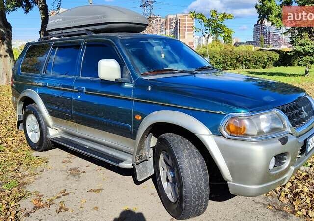 Зелений Міцубісі Паджеро Спорт, об'ємом двигуна 2.97 л та пробігом 230 тис. км за 7200 $, фото 5 на Automoto.ua