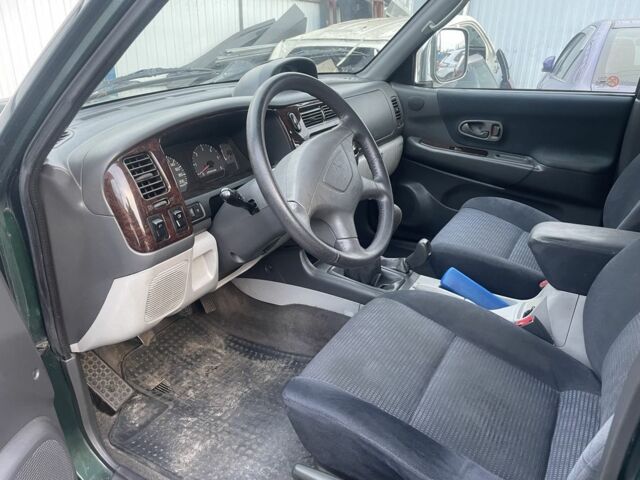 Зеленый Мицубиси Паджеро Спорт, объемом двигателя 2.5 л и пробегом 200 тыс. км за 4200 $, фото 4 на Automoto.ua