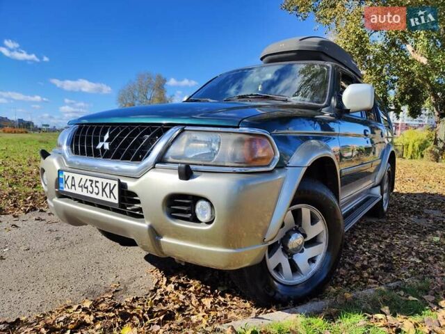 Зелений Міцубісі Паджеро Спорт, об'ємом двигуна 2.97 л та пробігом 230 тис. км за 7200 $, фото 1 на Automoto.ua