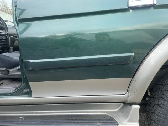 Зеленый Мицубиси Паджеро Спорт, объемом двигателя 2.5 л и пробегом 200 тыс. км за 4200 $, фото 6 на Automoto.ua