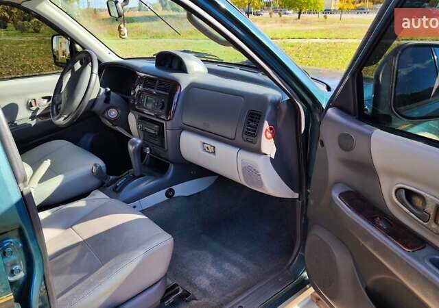 Зелений Міцубісі Паджеро Спорт, об'ємом двигуна 2.97 л та пробігом 230 тис. км за 7200 $, фото 13 на Automoto.ua