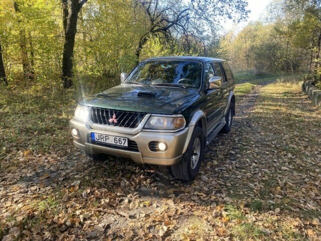Зеленый Мицубиси Паджеро Спорт, объемом двигателя 2.5 л и пробегом 333 тыс. км за 4900 $, фото 1 на Automoto.ua