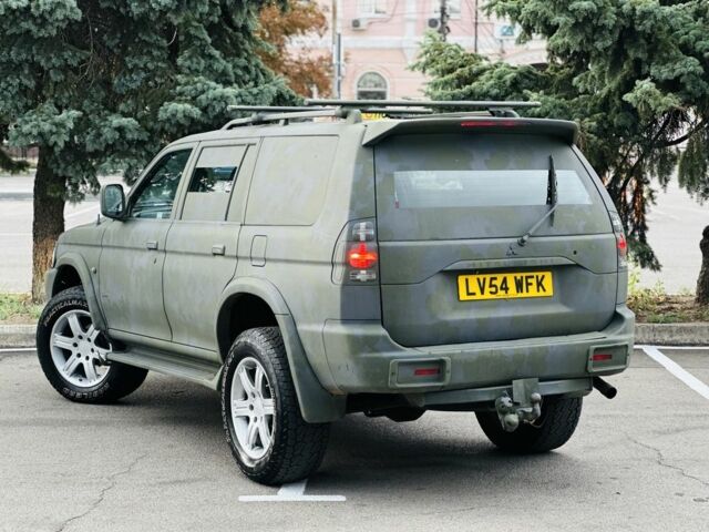 Зеленый Мицубиси Паджеро Спорт, объемом двигателя 2.5 л и пробегом 250 тыс. км за 3850 $, фото 4 на Automoto.ua