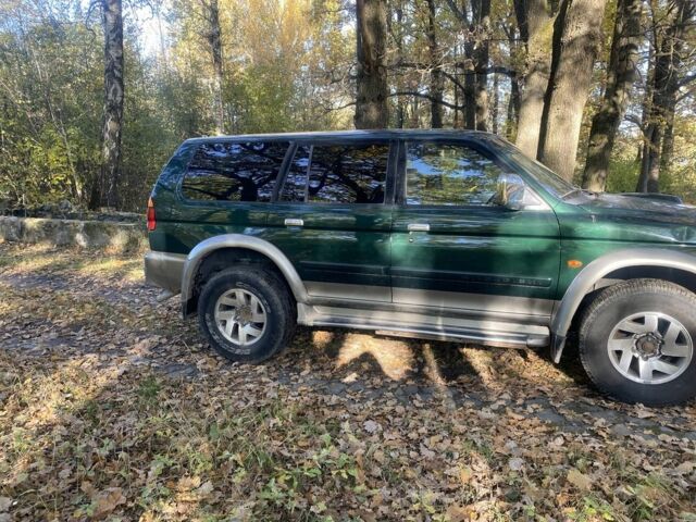 Зеленый Мицубиси Паджеро Спорт, объемом двигателя 2.5 л и пробегом 333 тыс. км за 4900 $, фото 3 на Automoto.ua